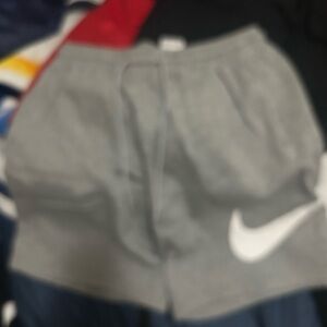 Nike Grey Athletic Shorts with White Swoosh